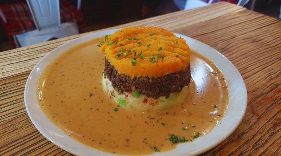 Delicious Makars homemade beef-lamb haggis with heather honey and turnip puree